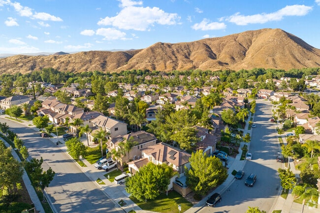 Nestled amidst natural beauty, Canyon Hills houses offer a life of peace and elegance.