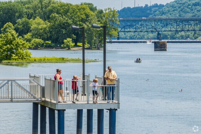 Residents enjoy fishing off the docks at the river in West O'Hara Township.
