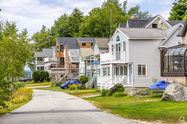 A row of unique lakefront homes sits along Lake Sunapee in Newbury, NH.