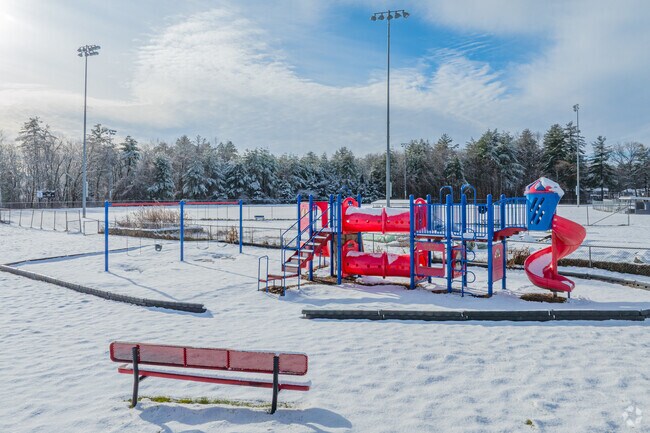 The Michele Memorial Park playground anchors family-friendly amenities.