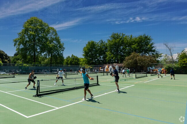 Green Lake's abundance of outdoor activities includes lake side tennis courts