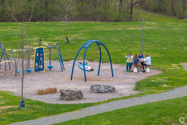 Camp Olympic Park hosts unique swings and playground equipment to tire the kids out.