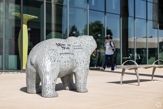 Missouri State University students enjoy campus just outside Robberson.