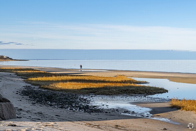 Brewster Flats reveal sandy white beaches at low tide along Cape Cod Bay.