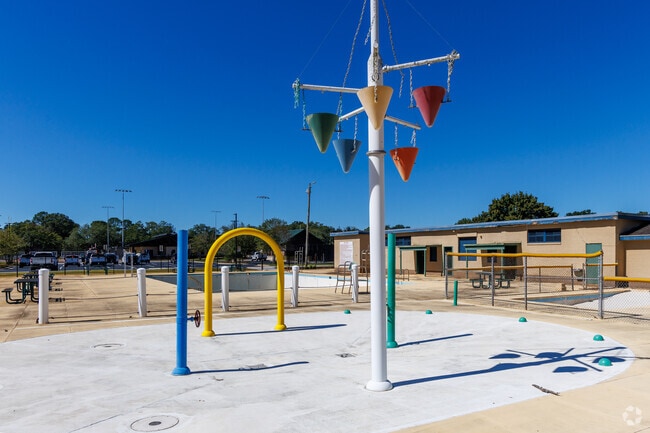 The pool and play areas at Carver Park provide fun for all ages in Dixieland.