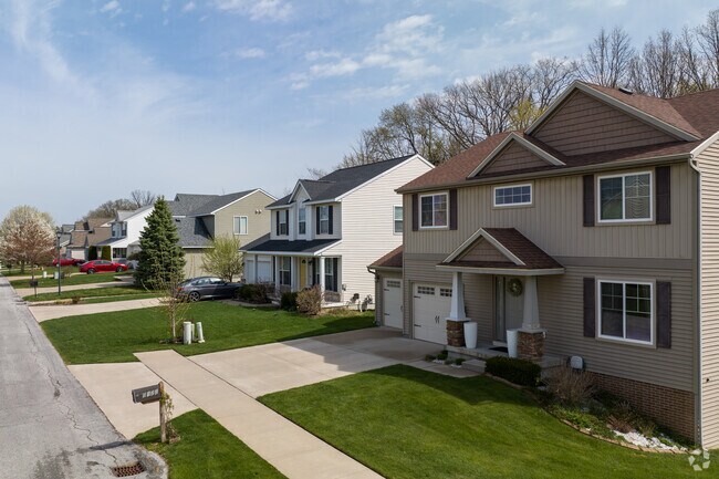 Row of several two story homes in south side of Bailey's Grove located in Kentwood, MI.
