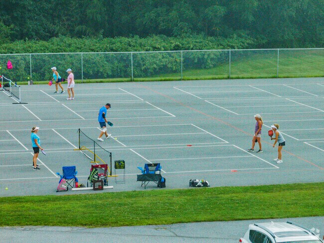 Serving up some fun under the Lancaster sun at Oyster Point's tennis courts.