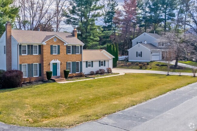Beautiful landscaping and manicured lawns surround the elegant homes of Darnestown neighborhood.