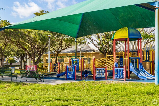 Play a fun game at the Deerfield Bonita Lakes Park playground in Miami, FL.