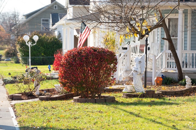 Many people have flags hanging on the outside of their homes.