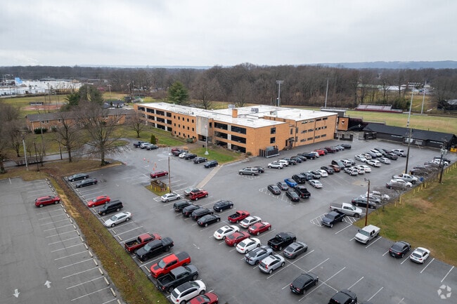 The student population of Holy Cross High School is 237.