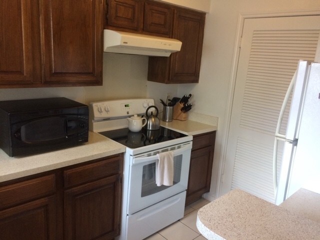 kitchen, pantry and laundry (behind door)
