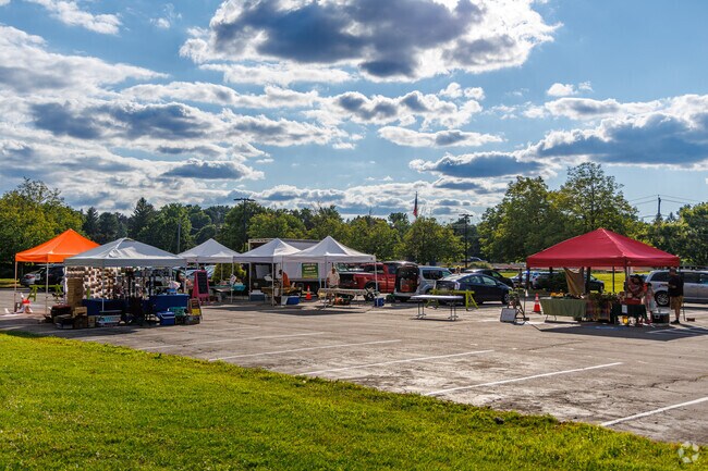 Rain or shine you will find many local vendors under tents at the DeWitt Farmer's Market.