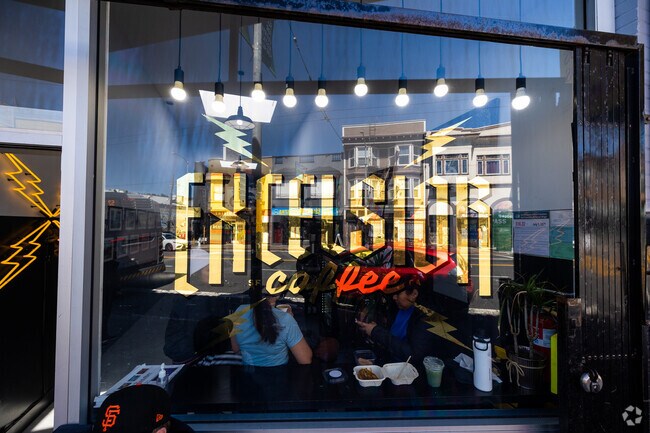 Excelsior Coffee sits next to Glazed Donut on the corner of Excelsior and Mission Street.