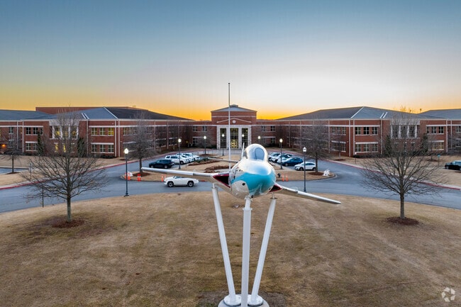 A retired US Navy Jet sits in front of James Clemens High School in Madison Alabama.
