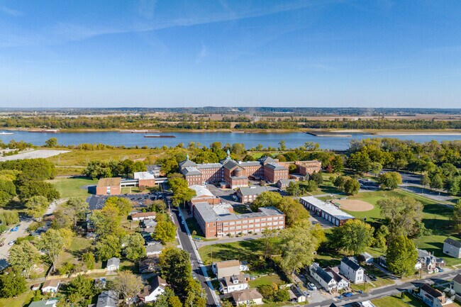 Aerial overview of Notre Dame school near the Mississippi river.