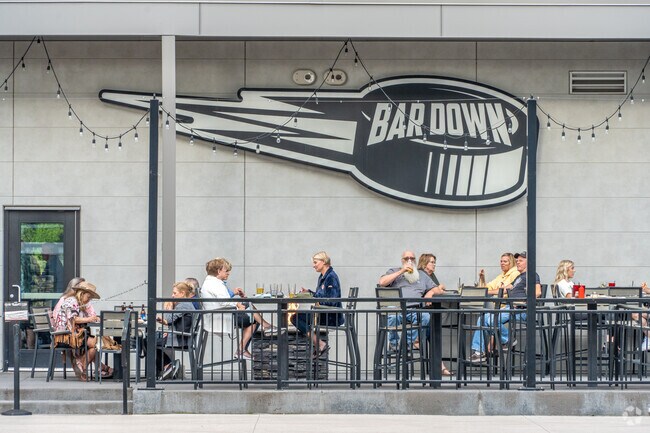 Gather with friends at Bar Down, a popular meetup spot near Brooks Harbor.