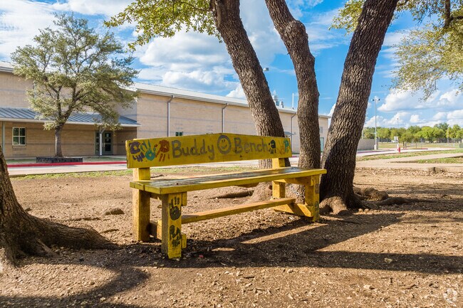 The buddy bench at Deer Creek Elementary School is a popular hangout spot in Cedar Park.