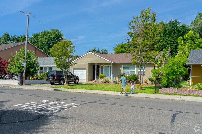 Man in Michigan-Glide-Sutter walks daughter home from school.