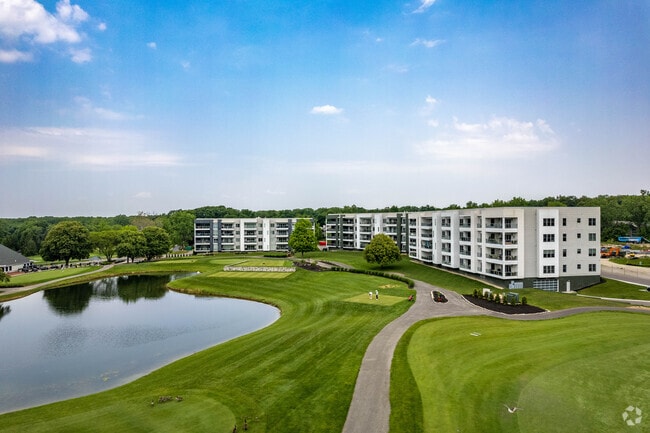 Highpointe at Little Turtle are the premiere new condominium homes located astride the lush greenery of The Golf Course at Little Turtle.