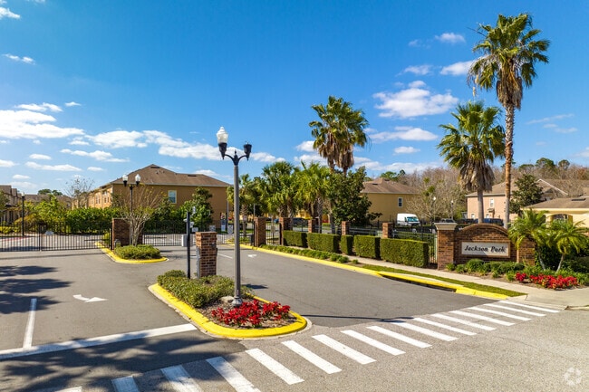 Residents can live in the private gated community of Jackson Park in Meadow Woods, Florida.