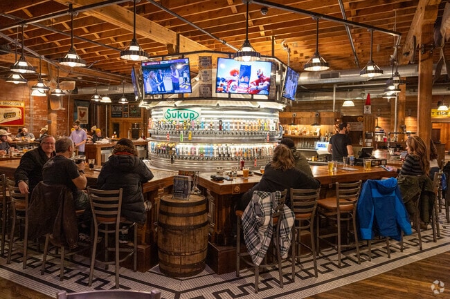 The Iowa Taproom is known for over 100 beers served from a grain bin bar.