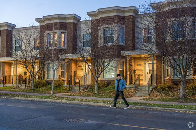 A person walking towards the shopping district near the Morningside neighborhood.