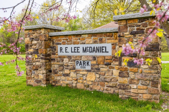 The field stone sign welcomes visitors to McDaniel Park.