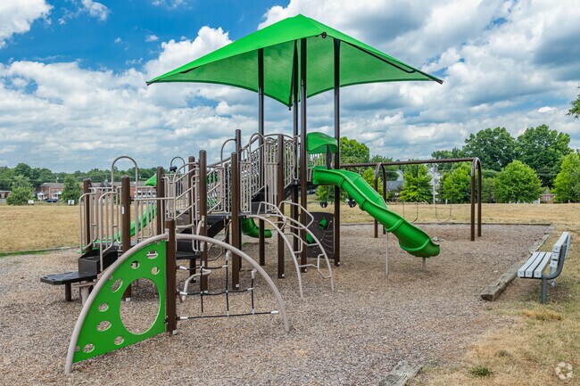 Swing, slide and hang on the modern playground at Washington Park.