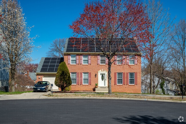 A classic colonial-style home in Coral Hills showcases the neighborhood’s timeless architecture.