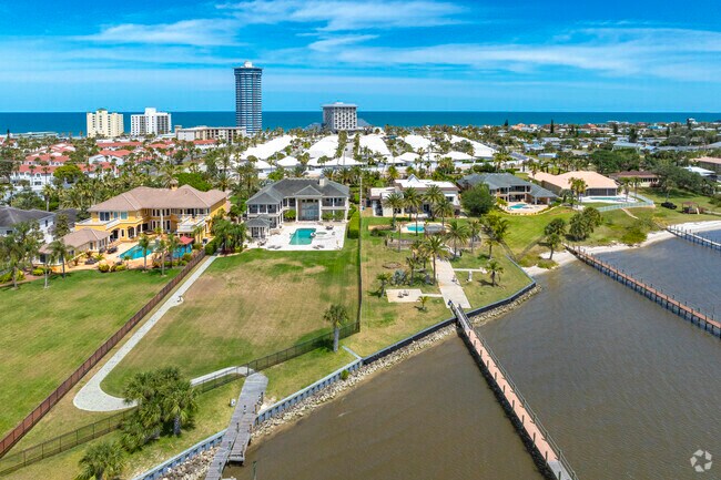 Homes with large yards and boat docks are common along the riverside in Daytona Beach Shores.