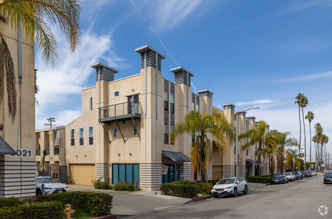 Manchester Square includes apartment buildings with access to nearby parks and retail.