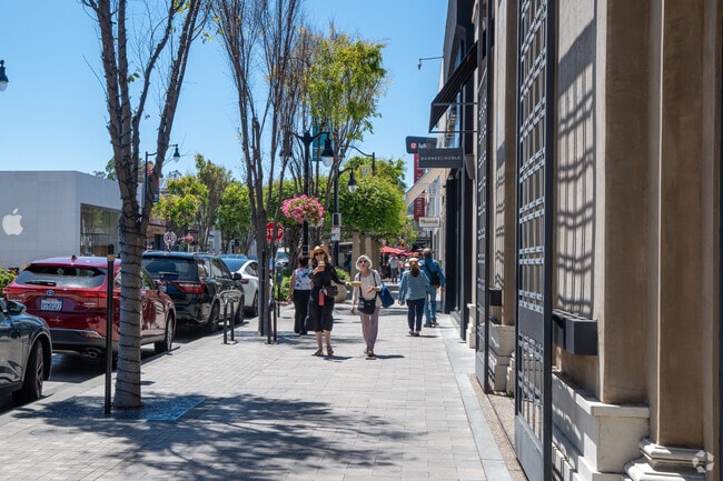 Strollers relish the lively scene on Burlingame Avenue.