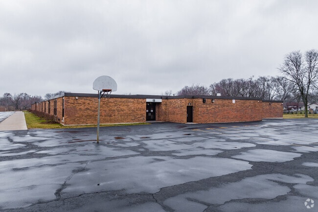 Anne Fox Elementary School features a low to the ground, brick architecture.