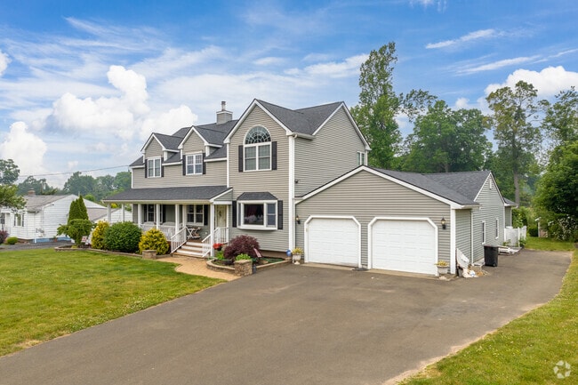 This updated Colonial-style home resides in North Haven.