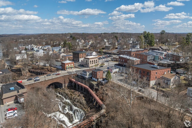 Brick buildings, local shops, and a scenic waterfall give the Village of Wappingers Falls its timeless character.