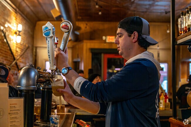 Gather with friends after work for craft cocktails at Red Brick Tap & Barrel in Alpena.