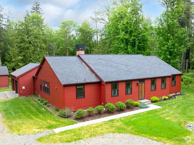 A beautiful red painted rambler home in the Graham neighborhood.