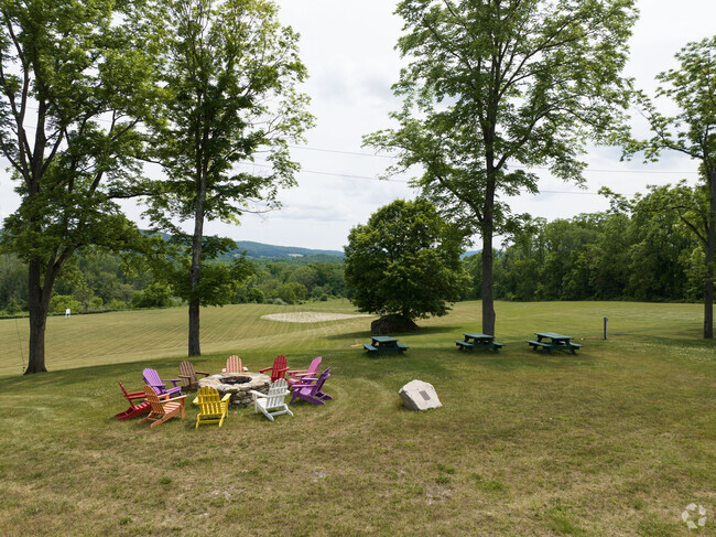 A quiet fire pit area for students to reflect and think about their day at Maplebrook in Amenia.