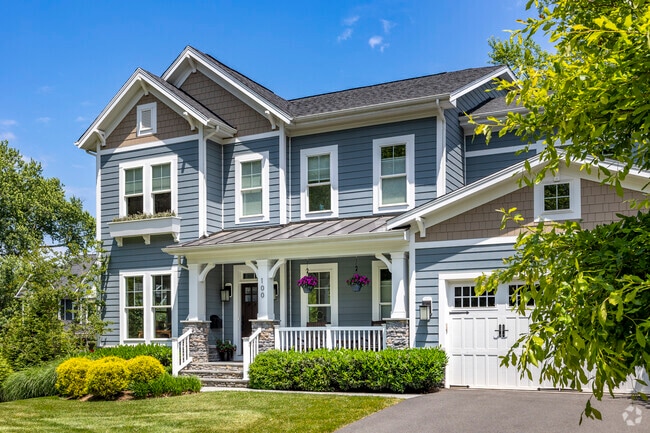 Beautiful landscaping and manicured lawns surround the elegant homes of West Falls Church.