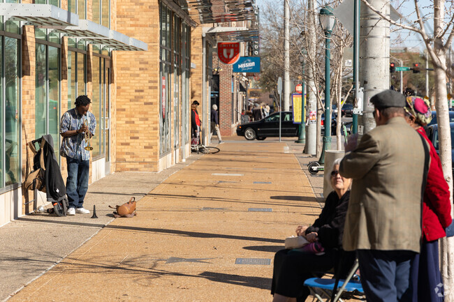 Jazzy trumpet sounds fill the West End air as you stroll along the busy streets.