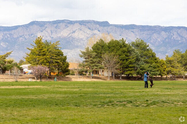 The large parks and mountain views are some of the perks of living in Arroyo del Oso.