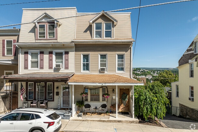 Townhouse-style homes with faux mansard roofs appear in Pottsville.