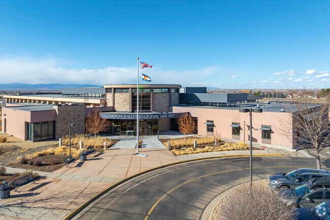 The Carbon Valley Regional Library in Firestone, CO, is a community hub that offers a wide range of resources, programs, and events, fostering a love for reading and lifelong learning among residents of all ages.