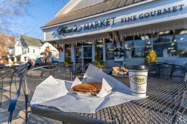 Purchase staples and enjoy prepared foods on the patio at Nica's Market in East Rock.