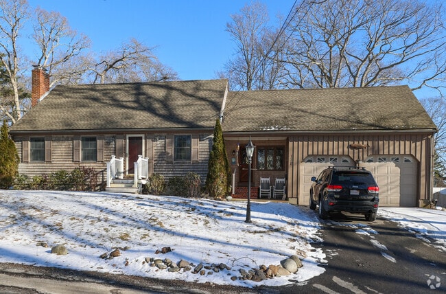 Cape Cods in Magnolia sit on tree filled lots.
