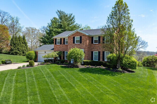 Many homes in Turpin Hills are New-Traditonal Colonial Revivals with brick influences.