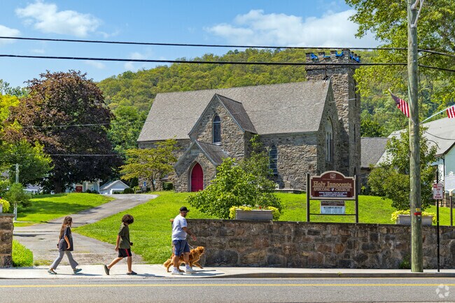The main street of Highlands is adorned with a charming display of quaint churches.