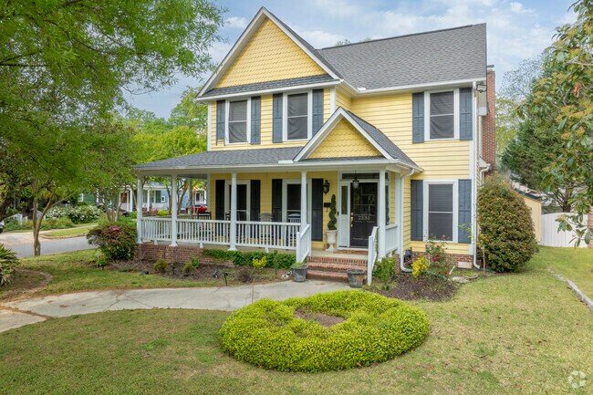 This bungalow has a distinct offset front porch.