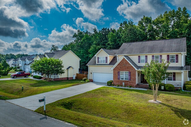 Half Moon homeowners care about their curb appeal, showcasing well manicured lawns.